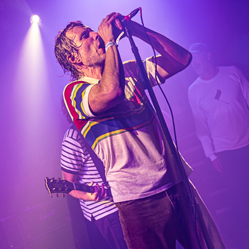 Singer Aaron Bruno of Barbarians of California singing with the crowd at a live show at The Troubadour, Los Angeles.