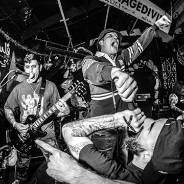 The band Bad World performing at Gilman